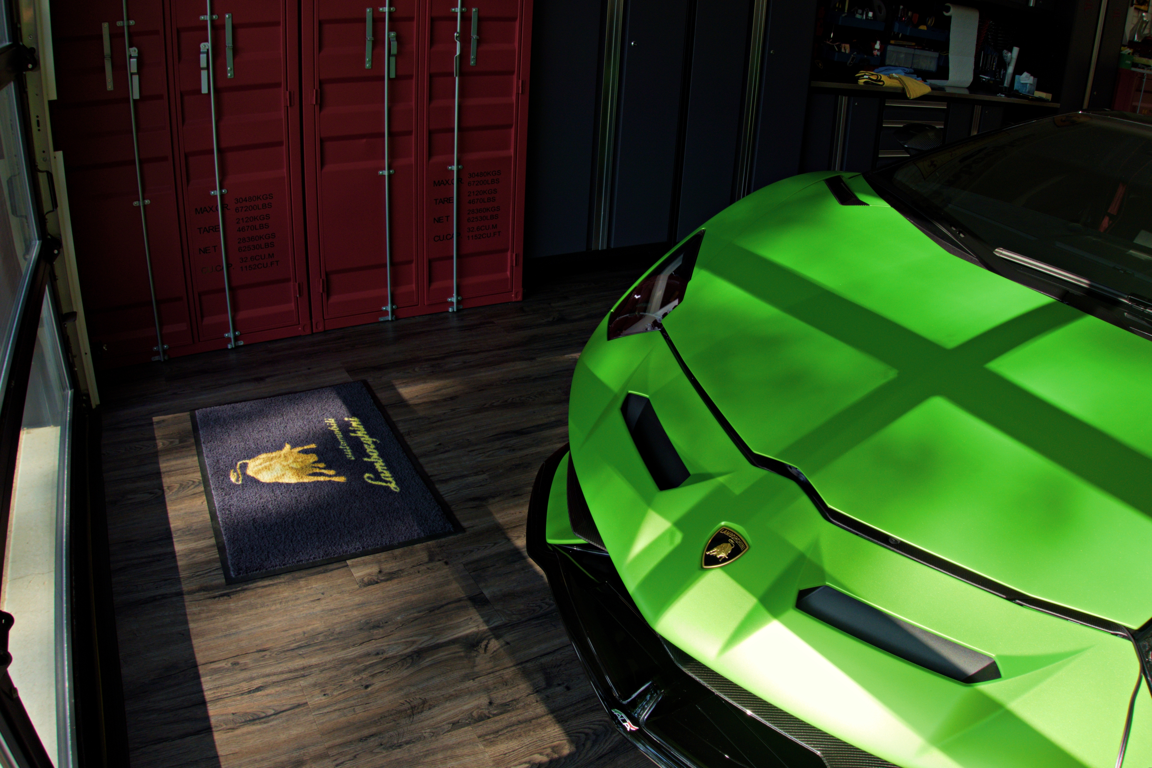 lamborghini aventador svj with a clean exterior in a garage